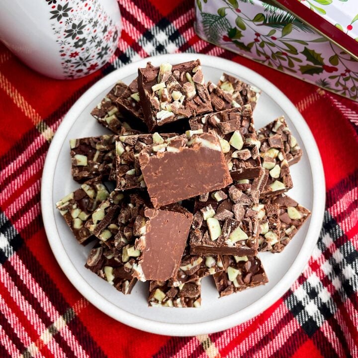 squares of 3 ingredient microwave fudge on a white plate