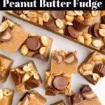 squares of no bake peanut butter fudge on parchment paper