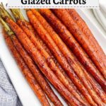 maple balsamic glazed carrots on a white platter