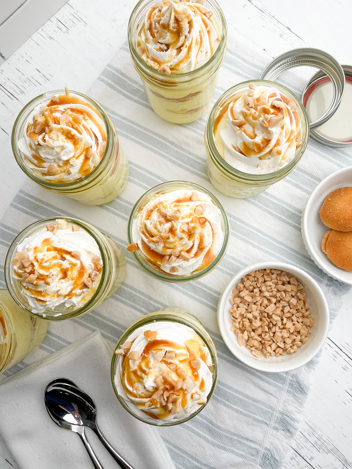 top view of mason jars filled with banana pudding.