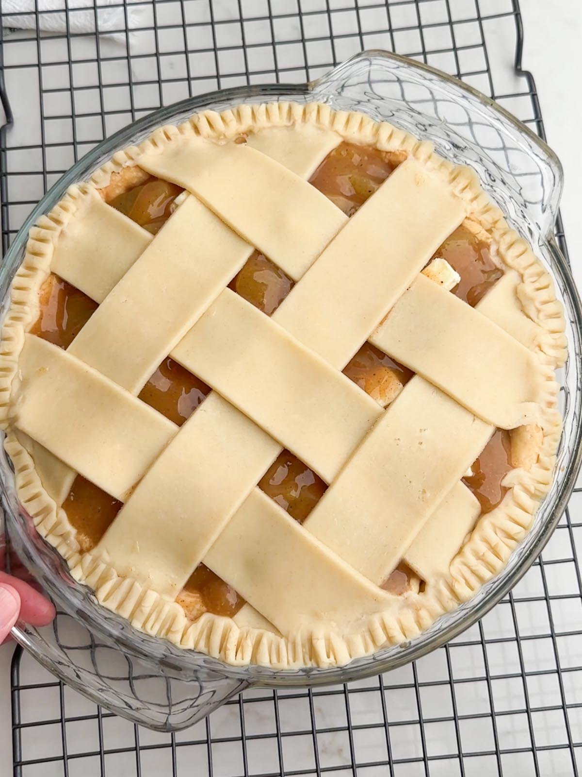 Pie dough edges crimped with a fork.