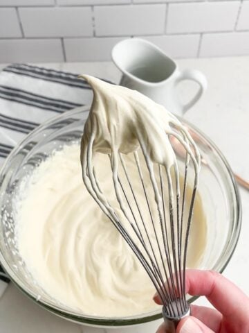 caramel whipped cream on a whisk.