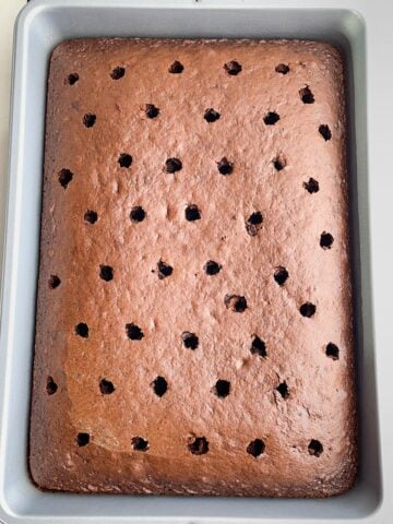chocolate cake with holes on top.