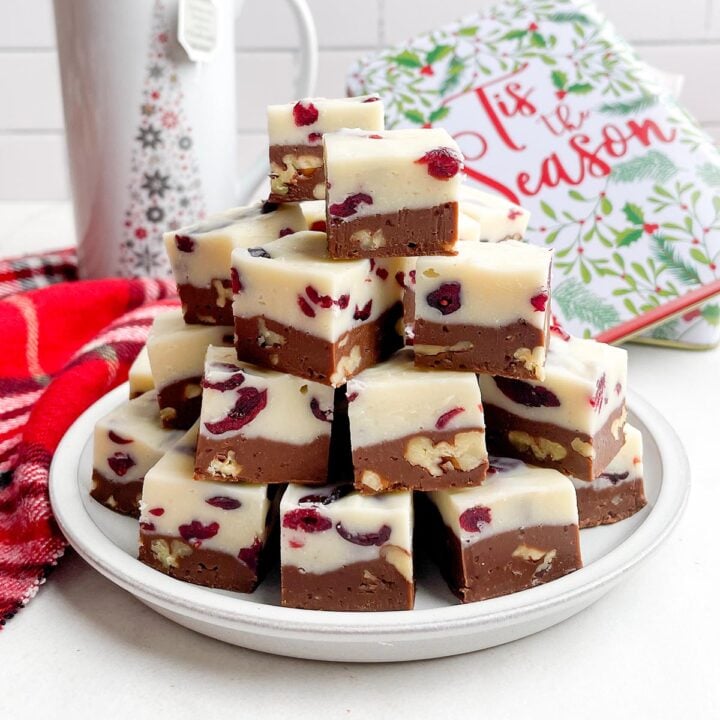 squares of Christmas fudge on a white plate