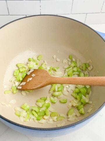celery and onions sauteed in olive oil in Dutch oven. 