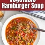 ground beef vegetable soup recipe in a white bowl