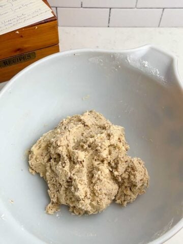 Mexican Christmas cookie dough in a white bowl.