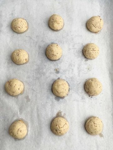 baked Mexican Christmas cookies on baking sheet.