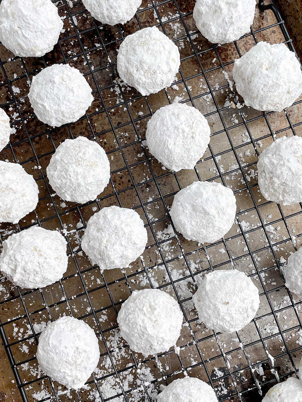 Mexican Christmas cookies on a wire rack.