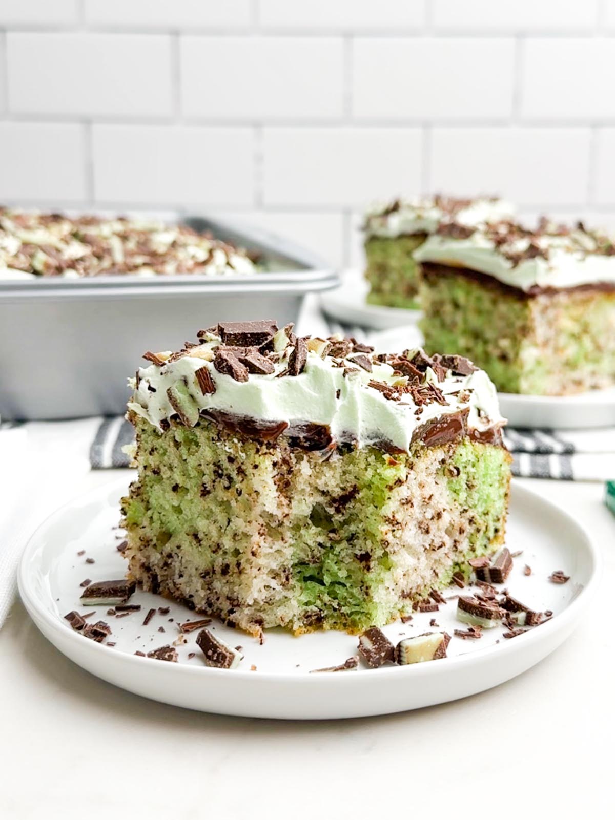 piece of mint chocolate cake on a white plate