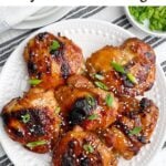 oven baked teriyaki chicken thighs on a white plate