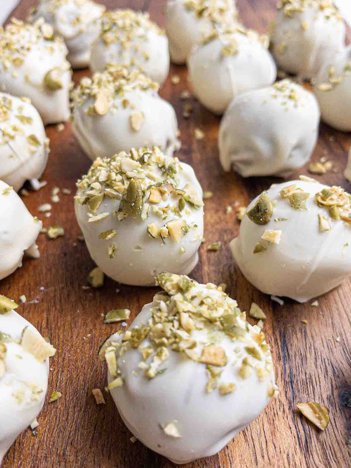 pumpkin gingerbread truffles on a wooden board