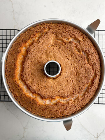 baked strawberry angel food cake in a tube pan.