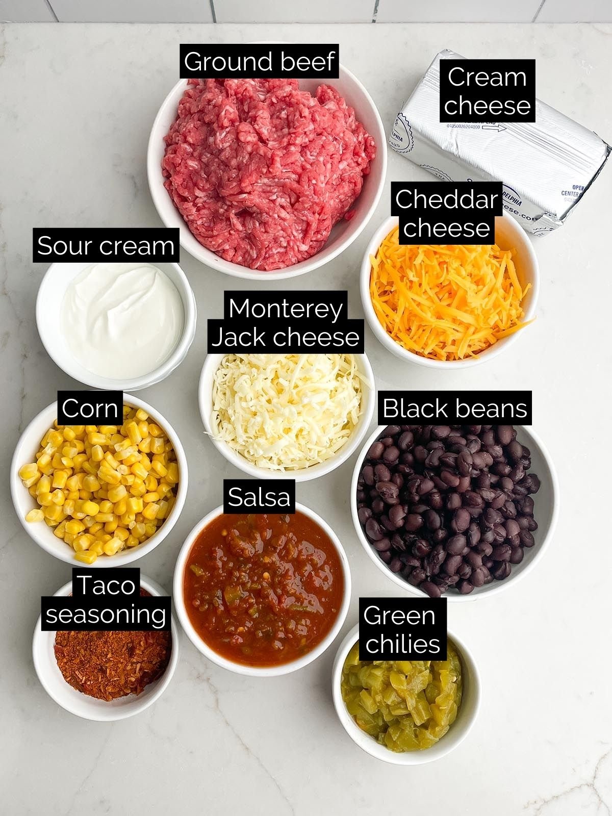 taco dip recipe with ground beef ingredients.
