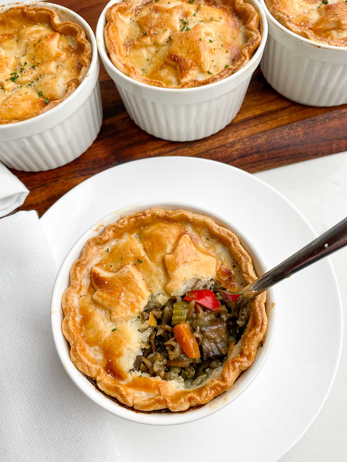 baked vegetarian pot pie in a white plate