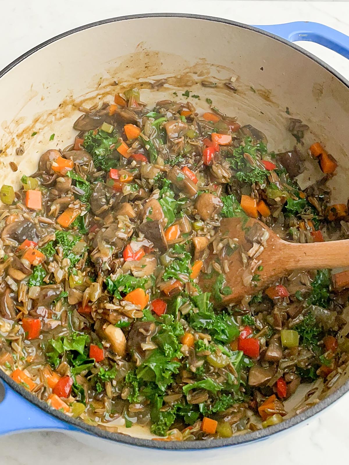 vegetarian pot pie filling in a dutch oven